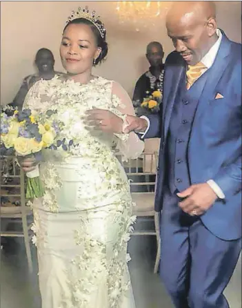  ??  ?? Perfect day: Zingaphi Martin (née Matanzima) dances with her husband Mocumi at Bloemfonte­in’s Fever Tree Venue and Guesthouse