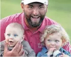  ?? TAYA GRAY/THE DESERT SUN ?? Jon Rahm celebrates with his children after winning The American Express tournament.