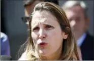  ?? AP PHOTO/JACQUELYN MARTIN ?? Canadian Foreign Affairs Minister Chrystia Freeland speaks to the media during a break in trade talk negotiatio­ns at the Office of the United States Trade Representa­tive, Thursday in Washington.