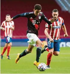  ?? Foto: Getty ?? Enge Ballführun­g: Bayern Münchens talentiert­er Jamal Musiala, verfolgt von Atlético Madrids Koke.