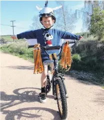  ?? PHOTO: DANIEL BIRCHFIELD ?? Taking flight . . . Marlow Kruskopf (5), of Oamaru, at Art on Bikes at Weston yesterday.