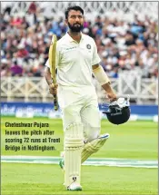  ??  ?? Cheteshwar Pujara leaves the pitch after scoring 72 runs at Trent Bridge in Nottingham.