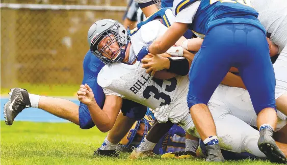  ?? RICKKINTZE­L/THE MORNING CALL ?? Northern Lehigh running back Matt Frame tries to squeeze out a few more yards in the second quarter Saturday at Wilson Area High School.