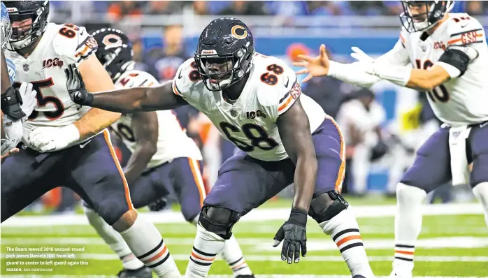  ?? RICK OSENTOSKI/AP ?? The Bears moved 2016 second-round pick James Daniels (68) from left guard to center to left guard again this season.