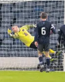  ??  ?? Great stop Queen’s keeper Michael White pulls off a great save to deny Raith’s Liam Buchanan late in the game