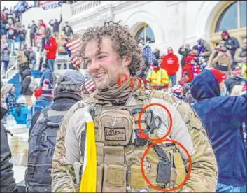  ?? U.S. Department of Justice ?? Robert Morss, of Glenshaw, Pa., is seen outside the U.S. Capitol on Jan. 6, 2021. Red circles on his attire were added by federal prosecutor­s.
