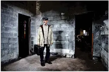  ?? PATRICK SEMANSKY/AP PHOTOS ?? Author Ed Maliskas stands in the performers’ dressing room of the dance hall that was built near abolitioni­st John Brown’s farmhouse. Dozens of black performers, including Ray Charles and Etta James played there in the 1950s and ’60s.