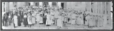  ??  ?? Gov. Charles H. Brough (center, in a light suit and bow tie) poses with 83 men and 63 women suffragist­s on the steps of the state Capitol. State Capitol historian David Ware IDs the photo as having been taken Feb, 27, 1917, the day the state Senate...