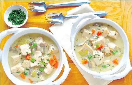  ??  ?? You can use leftover roast turkey from Thanksgivi­ng dinner to make this hearty fricassee.