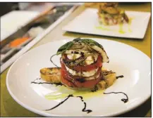  ?? (TNS/Visit Norfolk) ?? Todd Jurich’s Bistro offers the chef’s modern spin on classic southern fare.