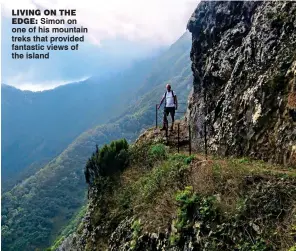  ??  ?? living on the edge:
Simon on one of his mountain treks that provided fantastic views of the island