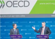  ?? AFP ?? El secretario de la OCDE, Mathias Cormann, junto al secretario de Estado de EEUU, Anthony Blinken.