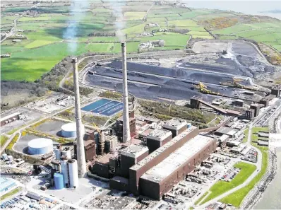  ??  ?? Second wind: Moneypoint’s time as coal-burning power station comes to an end in 2025 – but locals are optimistic its future as a major base for renewable energy is bright.