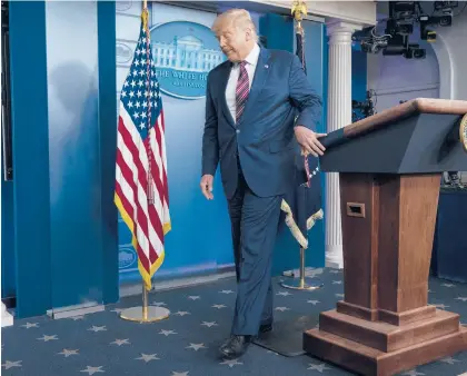  ?? EVANVUCCI/AP ?? President Donald Trump wraps up a statement about the election Thursday in the briefing room of the White House.