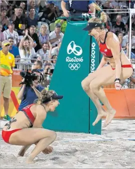  ?? Robert Gauthier Los Angeles Times ?? APRIL ROSS, left, and Kerry Walsh Jennings are overjoyed after defeating Brazil’s Larissa and Talita for the bronze medal in beach volleyball.