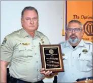  ??  ?? Maj. Richard Argo (left) presented the Respect for Law award for the Floyd County Sheriff’s Office to Deputy Harrison Dupree Monday.