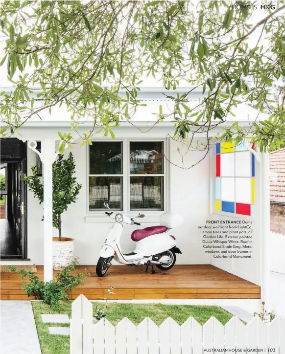  ??  ?? FRONT ENTRANCE Dome outdoor wall light from LightCo. Lemon trees and plant pots, all Garden Life. Exterior painted Dulux Whisper White. Roof in Colorbond Shale Grey. Metal windows and door frames in Colorbond Monument.