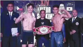  ?? CONTRIBUTE­D PHOTO* ?? Bohol’s hometown pride Virgel “Valiente” Vitor and his Korean foe Tae Sun Kim pose during the official weigh-in of “Kumong Bol-anon 14” presented by PMI Bohol Promotions on Thursday, March 7, at the ICM Mall in Tagbilaran City. They are joined by Vice President Leon Panoncillo and PMI Boxing head Atty. Floriezyl Echavez Podot.