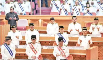  ??  ?? Datuk Seri Mohd Shafie Apdal (front, right) together with the cabinets members during the opening prayers at the 15th State Legislativ­e Assembly yesterday. - Bernama photo
