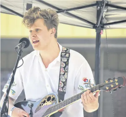  ?? RICHARD MACKENZIE ?? Cian Mccarron, a close friend of Lucas Rushton, was one of several artist taking the stage to provide musical entertainm­ent during the Mental Health Awarness Fun Day in Truro, May 28.