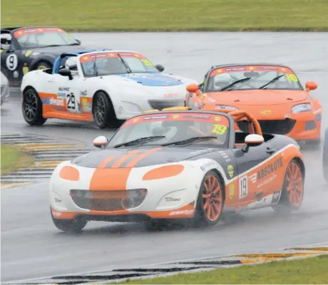  ?? Neil Lambert ?? Action from the Mazda MX5 super series at Anglesey Circuit