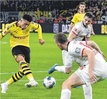  ?? FOTO: NORDPHOTO/IMAGO IMAGES ?? Aussichtsr­eichste Bayern-Jäger: Dortmund (links Jaden Sancho) und RB Leipzig.