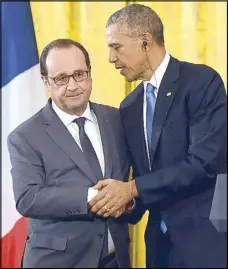  ?? AFP ?? French President Francois Hollande and US President Barack Obama shake hands during a joint press conference at the White House in Washington Tuesday.