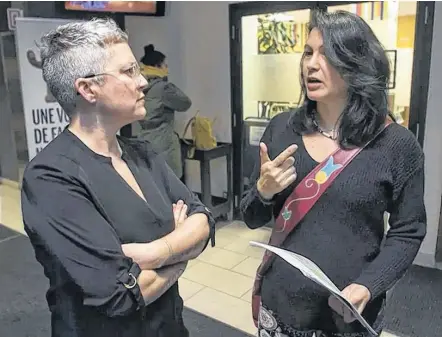  ?? JOHN KENNEY/POSTMEDIA NEWS ?? Nakuset (right), executive director of the Native Women’s Shelter of Montreal, speaks with researcher and Native Women’s Shelter volunteer Mel Lefebvre at Laurent Commission roundtable looking into Quebec’s youth protection system on Wednesday.