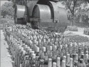  ?? REUTERS FILE/PHOTO FOR REPRESENTA­TION ?? A roadroller crushes liquor bottles.