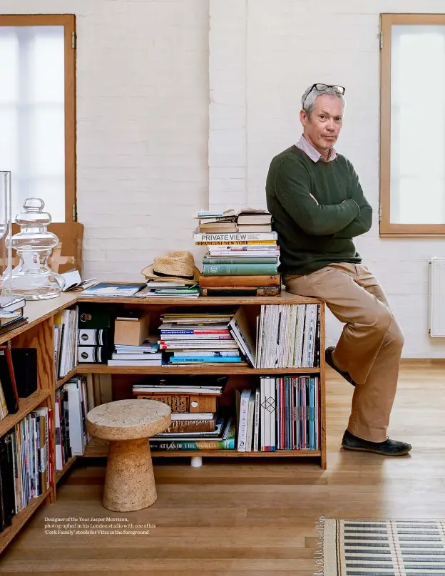  ??  ?? Designer of the Year Jasper Morrison, photograph­ed in his London studio with one of his ‘Cork Family’ stools for Vitra in the foreground