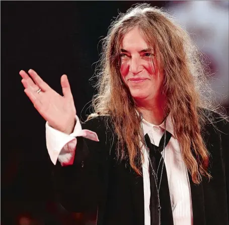  ?? VITTORIO ZUNINO CELOTTO, GETTY IMAGES FOR LANCIA/TNS ?? Patti Smith, shown in Italy in 2011, says tackling mundane household chores is helping her manage stress during the pandemic.