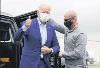  ?? PATRICK SEMANSKY — THE ASSOCIATED PRESS ?? Democratic presidenti­al candidate former Vice President Joe Biden arrives to board a plane at New Castle Airport in New Castle, Del., Wednesday, Sept. 9, 2020, en route to campaign events in Michigan.