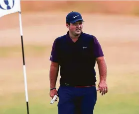  ?? Peter Morrison / Associated Press ?? Patrick Reed tested a variety of shots during a practice round at Carnoustie. He believes it will require “creative golf ” to win this week’s British Open.