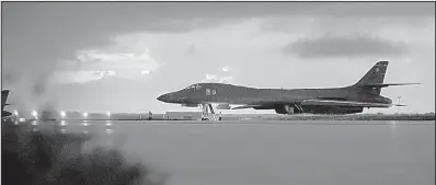  ?? AP/U.S. Air Force/STAFF SGT. JOSHUA SMOOT ?? A U.S. Air Force B-1B bomber prepares for takeoff Saturday at Andersen Air Force Base on the South Pacific island of Guam. Bombers from the base, along with F-15 fighter escorts from Okinawa, Japan, flew over internatio­nal waters near North Korea,...