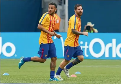  ?? AFP file ?? Lionel Messi (right) reckons that on a footballin­g level Real Madrid would be much stronger if Neymar joined them. —