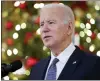  ?? EVAN VUCCI — THE ASSOCIATED PRESS ?? President Joe Biden delivers remarks on the November jobs report at the White House on Friday. He said his low, scratchy voice and occasional cough are “just a cold.”