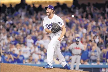  ?? AP FILE ?? Los Angeles pitcher Clayton Kershaw is staying with the Dodgers, agreeing to a $93 million, three-year contract Friday.