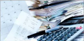  ??  ?? While some tax-related paperwork should be kept inde  nitely, items such as old utility bills mortgage statements can be shredded and discarded, keeping your home of  ce a bit neater.