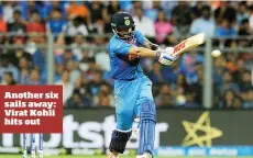  ??  ?? Another six sails away: Virat Kohli hits out