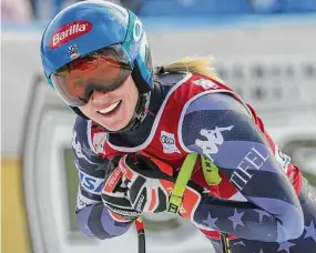  ?? Alessandro Trovati/Associated Press ?? Mikaela Shiffrin smiles as she gets to the finish area after completing an alpine ski women’s World Cup downhill race in Italy on Friday.