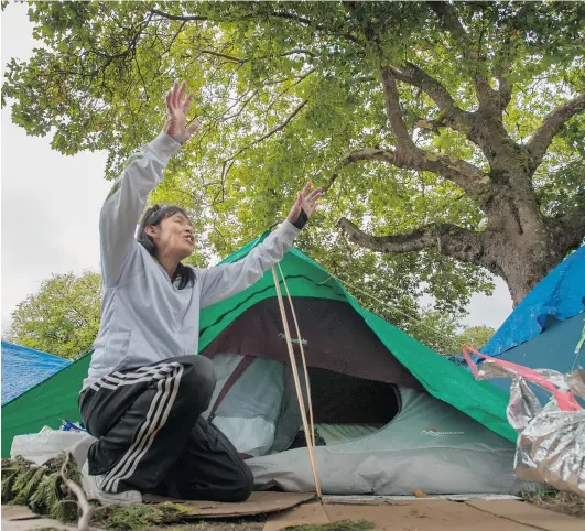  ?? ARLEN REDEKOP/PNG ?? Amyfaith House at her tent in Oppenheime­r Park in Vancouver. A homeless count in March found rough sleepers at 536, up considerab­ly from 154 in 2011.