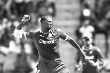  ??  ?? West Indies’ captain Jason Holder celebrates after dismissing India’s captain Virat Kohli during the fourth One Day Internatio­nal (ODI) match between West Indies and India at the Sir Vivian Richards Cricket Ground in St. John’s, Antigua, on July 2,...