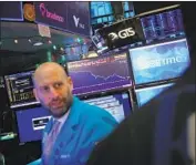  ?? Spencer Platt Getty Images ?? THE INVERSE correlatio­n between stocks and bonds has underpinne­d diversific­ation strategies.