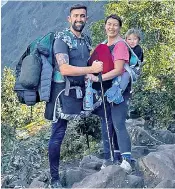  ?? ?? Two-year-old Carter Dallas, right, and with his parents Ross, and Jade, during their trek to Everest base camp