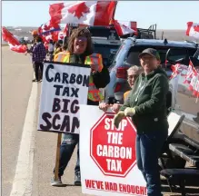  ?? Photos by Brendan Miller ?? GAS ON THE FUEL TAX PROTEST FIRE: More than 150 vehicles line the shoulder of the Trans Canada Highway near Walsh, Alta. on April 1. The protestors which were right at the Alberta/Saskatchew­an provincial border, were calling for the federal government to abolish the carbon tax which was officially introduced on the Monday.