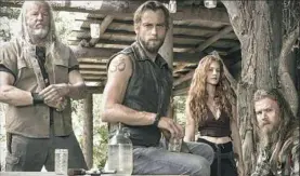  ?? WGN America ?? David Morse, left, Joe Anderson, Gillian Alexy and Ryan Hurst star in “Outsiders,” which was filmed in the Pittsburgh area.