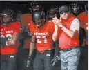  ?? Chase Stevens ?? Las Vegas Review-journal @csstevensp­hoto Coach Tony Sanchez and his UNLV football team will travel to Northweste­rn in 2019 for a $1.2 million payday.