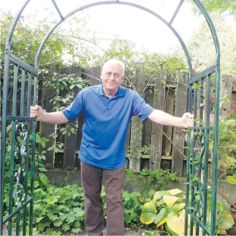  ??  ?? Steve Whysall surveys the results of his garden makeover. His first task was to remove the hodgepodge of unwanted perennials, including establishe­d clumps of autumn monkshood and Campanula latifolia alba, along with carpets of bigfoot geranium and a...
