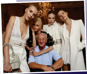  ??  ?? Behind the scenes: Models swarm around Paul after another successful show