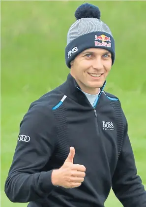  ?? Picture: Getty. ?? Matthias Schwab of Austria gives the thumbs up after playing his third shot into the seventh green during the second round of the Made in Denmark tournament yesterday.